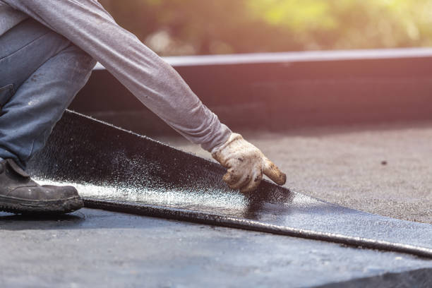 Professional Basement Waterproofing technician working in Zenda, KS